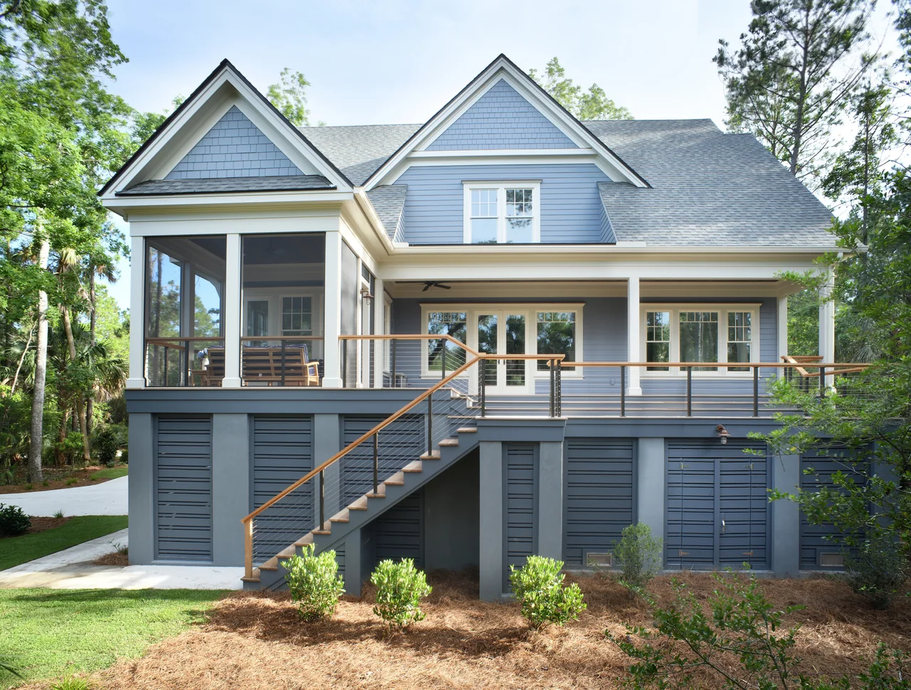 Rear elevation with a screened porch and deck